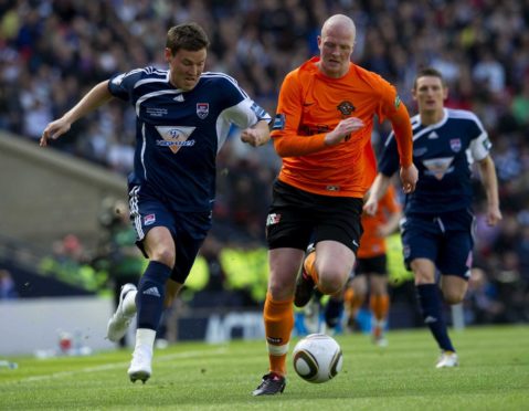 Ross County's Andrew Barrowman (left) gets away from Garry Kenneth in 2010 Scottish Cup final.