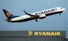 File photo dated 31/03/09 of a Ryanair Jet taking off from Stansted Airport. The no-frills airline is to add 25p to all bookings from next week to cover the cost of the European Emissions Trading System (ETS) green tax scheme. PRESS ASSOCIATION Photo. Issue date: Thursday January 12, 2012. Ryanair, which will bring in the levy from Tuesday January 17, described ETS as an 'eco-looney tax'. See PA story AIR Tax. Photo credit should read: Chris Radburn/PA Wire