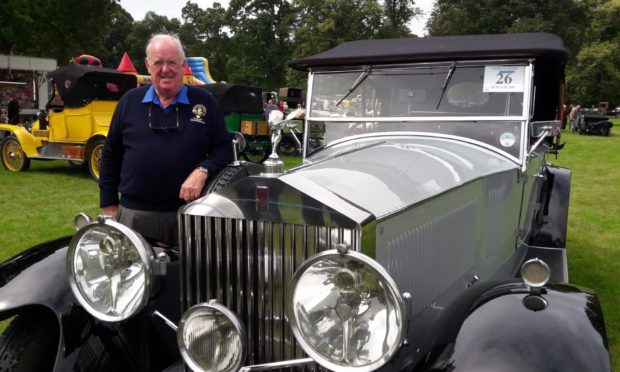 David Robertson with his vintage Rolls-Royce.