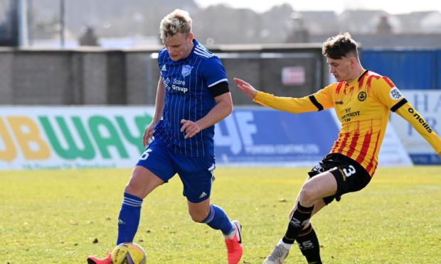 Jason Brown, left, is staying with Peterhead