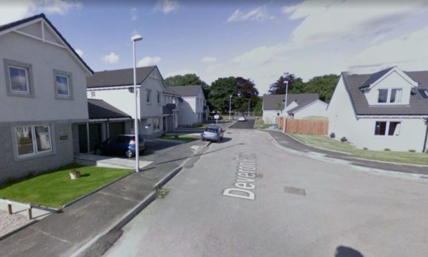 Man charged after police officer assaulted during early morning house fire in Deveron Park