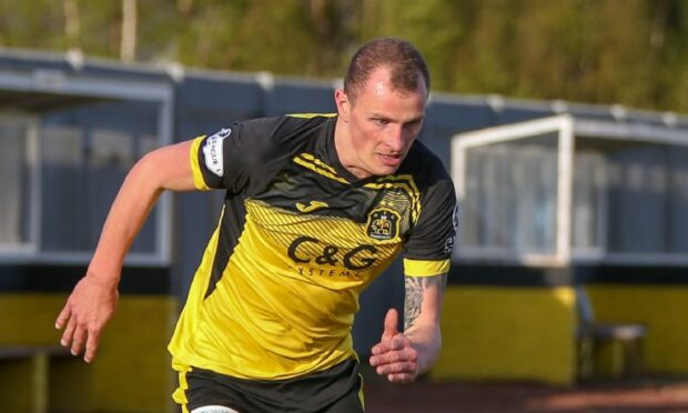 Jaime Wilson in action for Dumbarton.