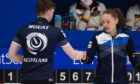 Bruce Mouat (left) and Jen Dodds shake hands following Scotland's 7-4 victory over Canada at the Curling Mixed Doubles World Championships in Aberdeen.