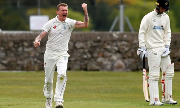 Stoneywood-Dyce bowler Jon Grant celebrates.