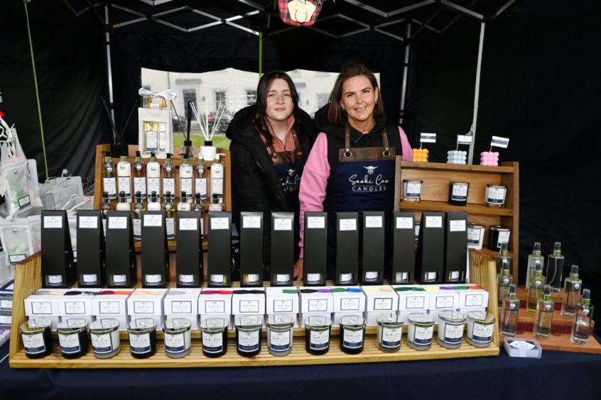 CR0028341
Food and Drink - Chapelton farmers' market at Burgess Park, Chapelton, Aberdeenshire.
Picture of Sooki Coo Candle Stall - (L-R) Jayden Low and Jackie Anderson.

Picture by Kenny Elrick     23//2021