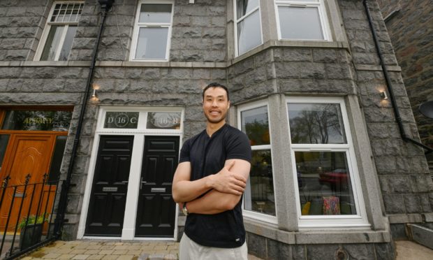 Property developer Jonathan Lau has transformed an old guesthouse into luxury apartments.