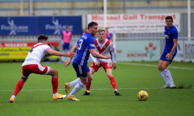 Cove's Rory McAllister in action against Airdrieonians.