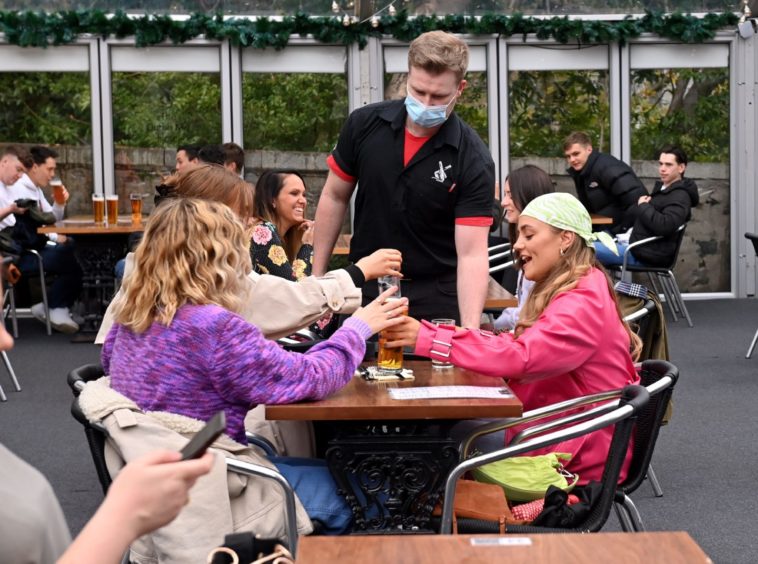 People enjoying being able to meet up for a drink again at the Dutch Mill, Aberdeen.