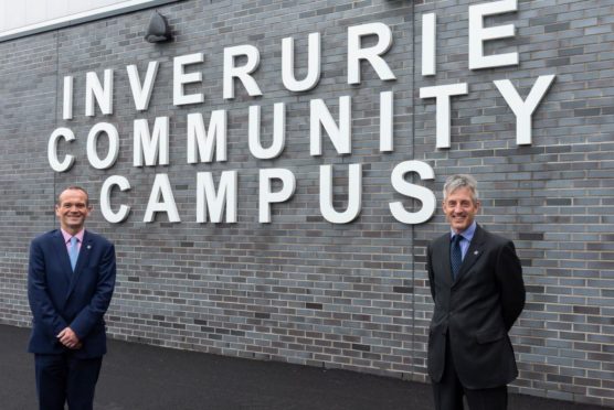 Laurence Findlay with Aberdeenshire Council chief executive Jim Savege.