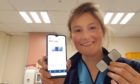 Western Isles podiatrist Louise Campbell with the heart rhythm-detecting Kardia device.