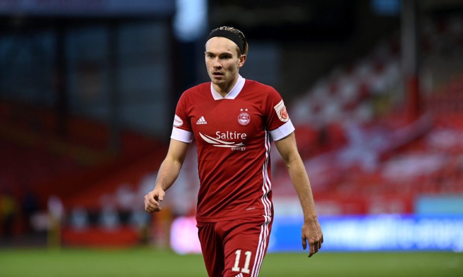 Ryan Hedges in the Dons' 2020/21 club strip