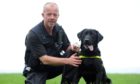George Shearer was serious injured in the crash and police dog Sam had to be put down
