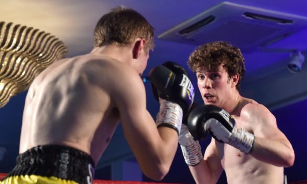 Elgin welterweight Andrew Smart, right, in action.