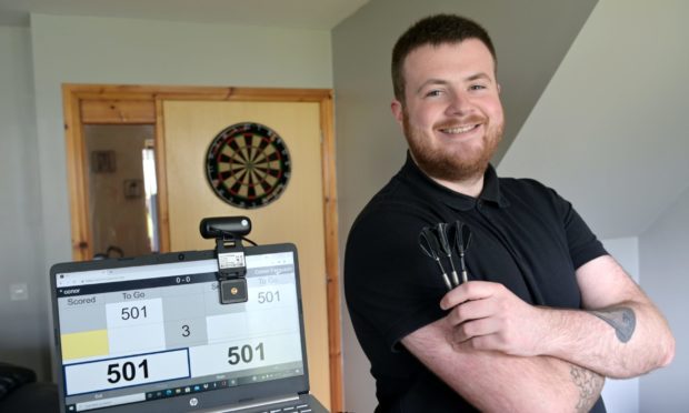 Conor Ferguson wants to take his improving darts form into the local leagues after sharpening up virtually.  Picture by Sandy McCook