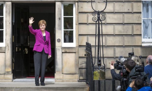 Crest of a wave: First Minister Nicola Sturgeon enters a new Holyrood term with a packed slate.