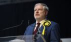 SNP Candidate for Edinburgh Central, Angus Robertson speaks after winning his seat for at the  Parliamentary Elections at Ingliston Highland Centre, Edinburgh. Picture date: Friday May 7, 2021. PA Photo. See PA story POLITICS Elections. Photo credit should read: Lesley Martin/PA Wire