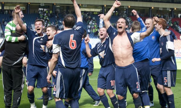 Ross County players celebrate after beating Celtic in the 2010 Scottish Cup semi-final.