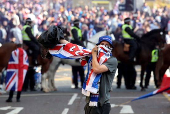 Some of the images of Rangers fans in George Square were shocking, writes Iain Maciver