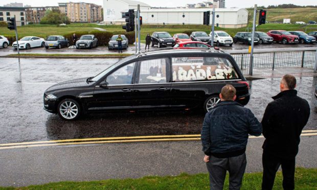 Funeral of Bradley Allan, the Anxiety Bloke, passes mourners lining the Beach Boulevard