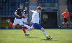 Blair Yule in action for Cove Rangers against Falkirk.