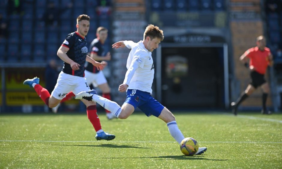Blair Yule in action for Cove Rangers against Falkirk.