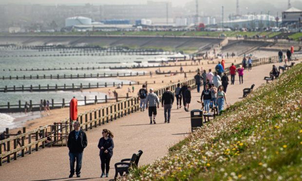 Locals headed to Aberdeen beach to catch the sun.