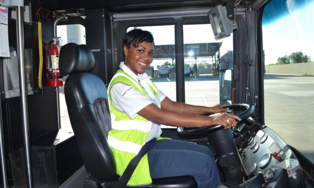 A driver and bus in FirstGroup's North American First Transit business.