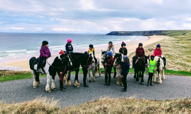 Traigh Mhòr Pony Trekking staff and members of its Junior Saddle Club.