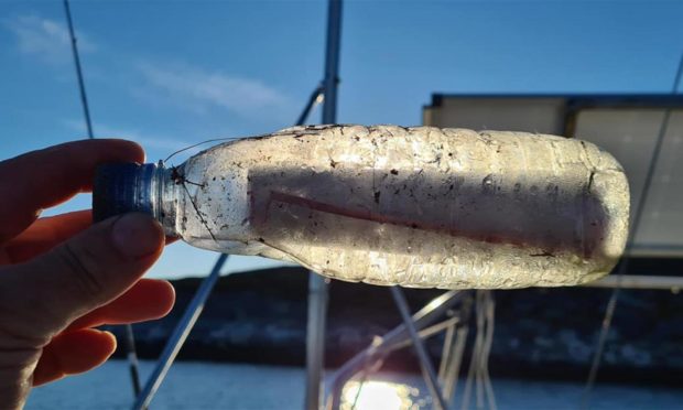 The bottle travelled 874 miles in 18 years.