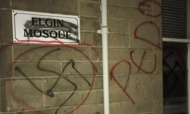 A swastika on the side of Elgin mosque