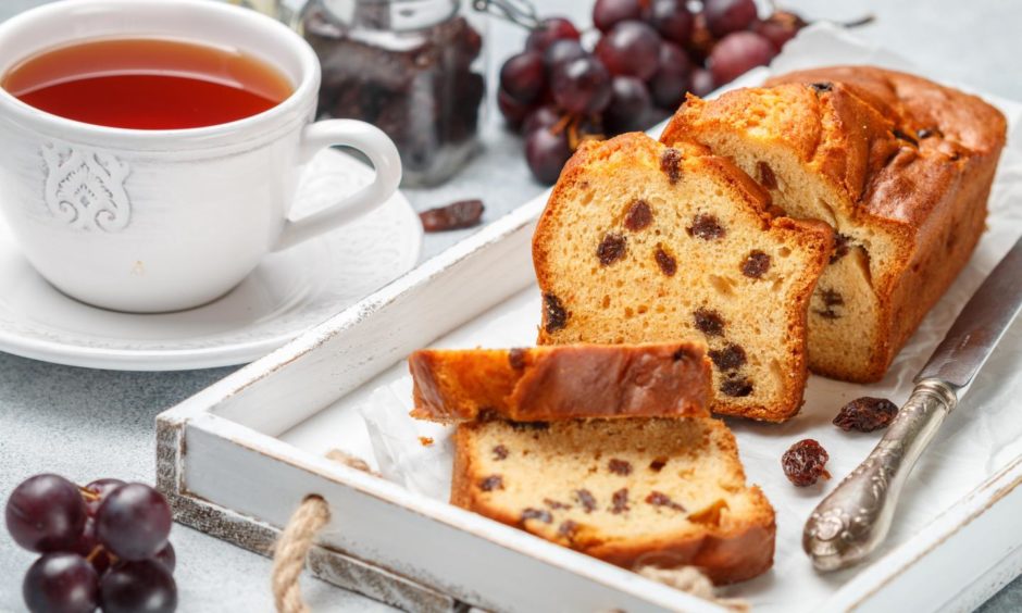 Bowl of ground coffee and beans isolated on white background, top view; Shutterstock ID 1369776482; Purchase Order: Apollo Food and Drink ; Job: Aunt Kate's Kitchen; 74d95a0f-9df3-4baf-ae46-55313db0313c