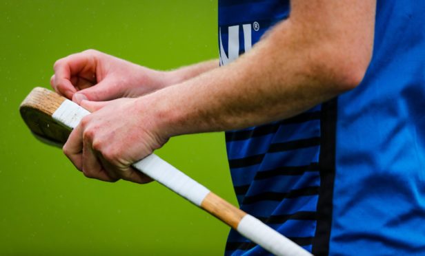 Malcolm Clark suffered an ankle injury in Oban Camanachd's cup win