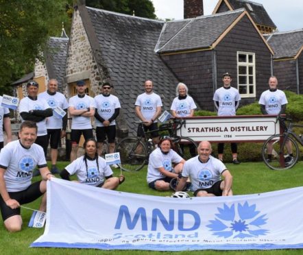 team Chivas Brothers at Strathisla Distillery in Keith after their 200-mile cycle from Dunbarton for MND Scotland.