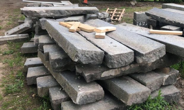 Police have revealed no one - not Aberdeen City Council or Balfour Beatty - has reported a stack of granite, pictured here in an Aberdeen garden, stolen from Union Terrace Gardens.