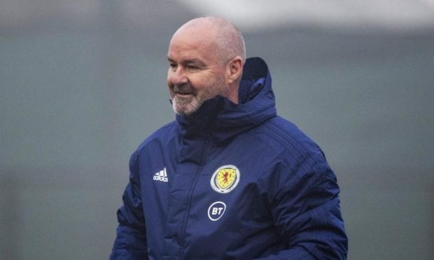 Scotland manager Steve Clarke in a blue Scotland jacket.