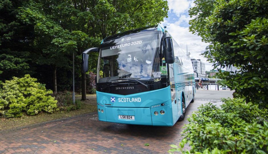 The Scotland team bus arrives in Glasgow on Sunday.