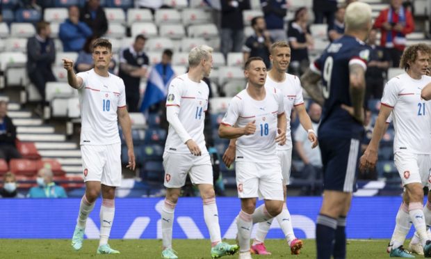 Patrik Schick (L) celebrates his first goal against Scotland.