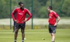 Scott Brown and Jay Emmanuel-Thomas during an Aberdeen training session at Cormack Park