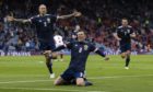 Callum McGregor celebrates after scoring to make it 1-1 against Croatia.