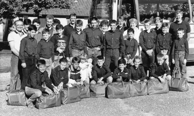 The boys and officers of the 67th Aberdeen (Mastrick Church) Company Boys' Brigade all set to leave Aberdeen for their summer camp in Wales in 1988.