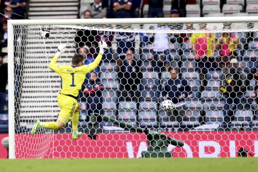 Scotland keeper David Marshall can only watch as Patrik Schick's shot flies into the back of the net.