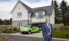 Green for go: Stuart Moggach, head of customer services for CALA Homes' North office, pictured next to one of the company's new 'green vans'.