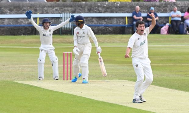 Aberdeenshire wicket keeper Joseph Horne and bowler David Gamblen appeal for out aganist Gordonians' Pranav Saravanan.