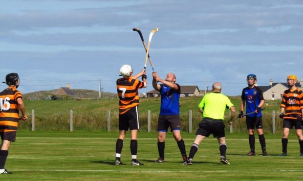 Camanachd Leodhais playing shinty. Picture from Facebook