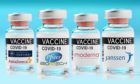 Vials of Covid-19 vaccine branded Oxford-AstraZeneca, Pfizer-BioNTech, Moderna and Janssen.