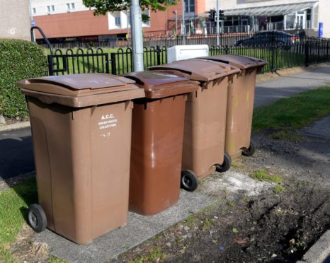 Brown bins awaiting collection.