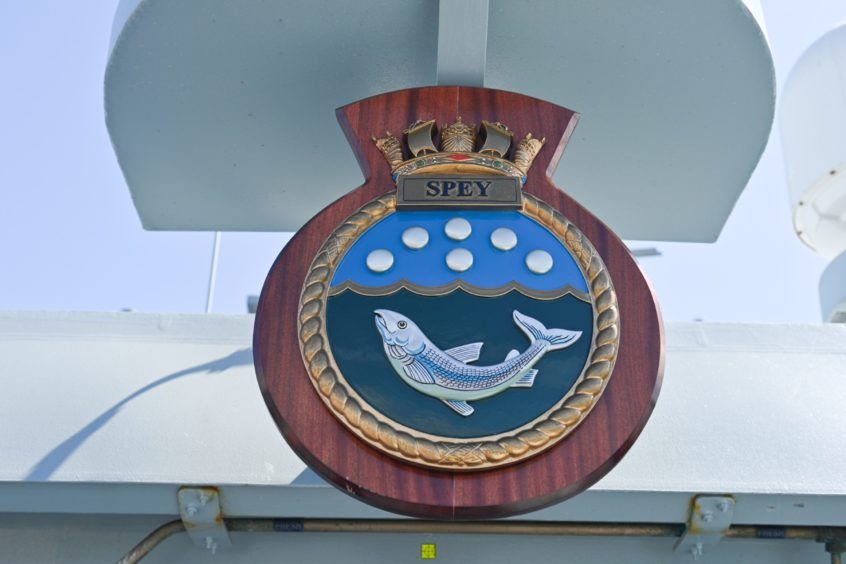 The crest of HMS Spey onboard the vessel.