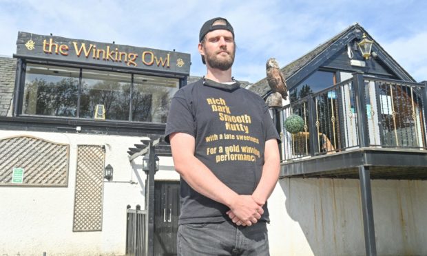 Michael Farry outside The Winking Owl in Aviemore. Picture by Jason Hedges