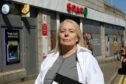 CR0028721
Fiona Campbell has started a petition against the possible closure of Seaton Post Office at Spar, St Machar Drive. She says it will lead to the isolation of elderly and vulnerable residents. 

Picture by Kenny Elrick     03/06/2021