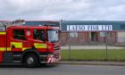 Fire service personnel have been called to the scene at the Dales Industrial Estate in Peterhead.